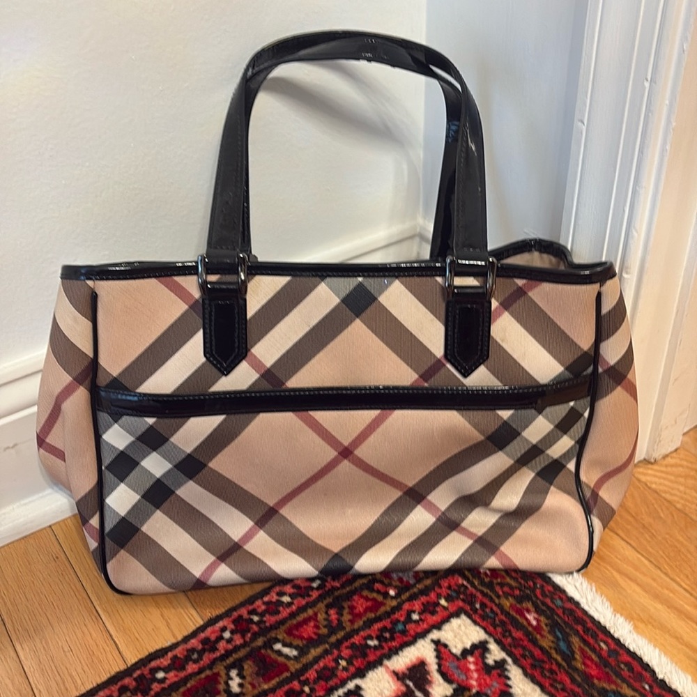 Make an offer!!
🌸SPRING SALE🌸

Burberry check handbag